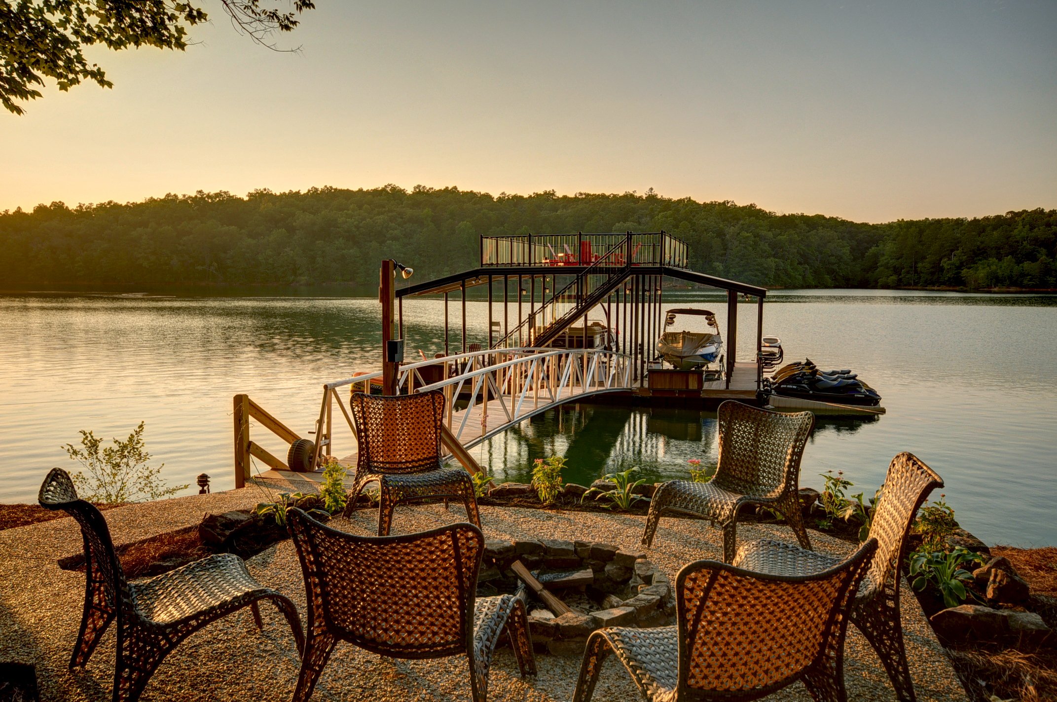 Wahoo aluminum floating dock and gangway on a lake at sunset